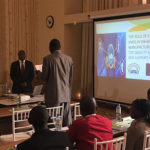 contains an image of people during training sponsored by SME support center